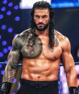 Roman Reigns with Chest Tattoo Next to Wrestling Ring LF CFuoOhcjAjM